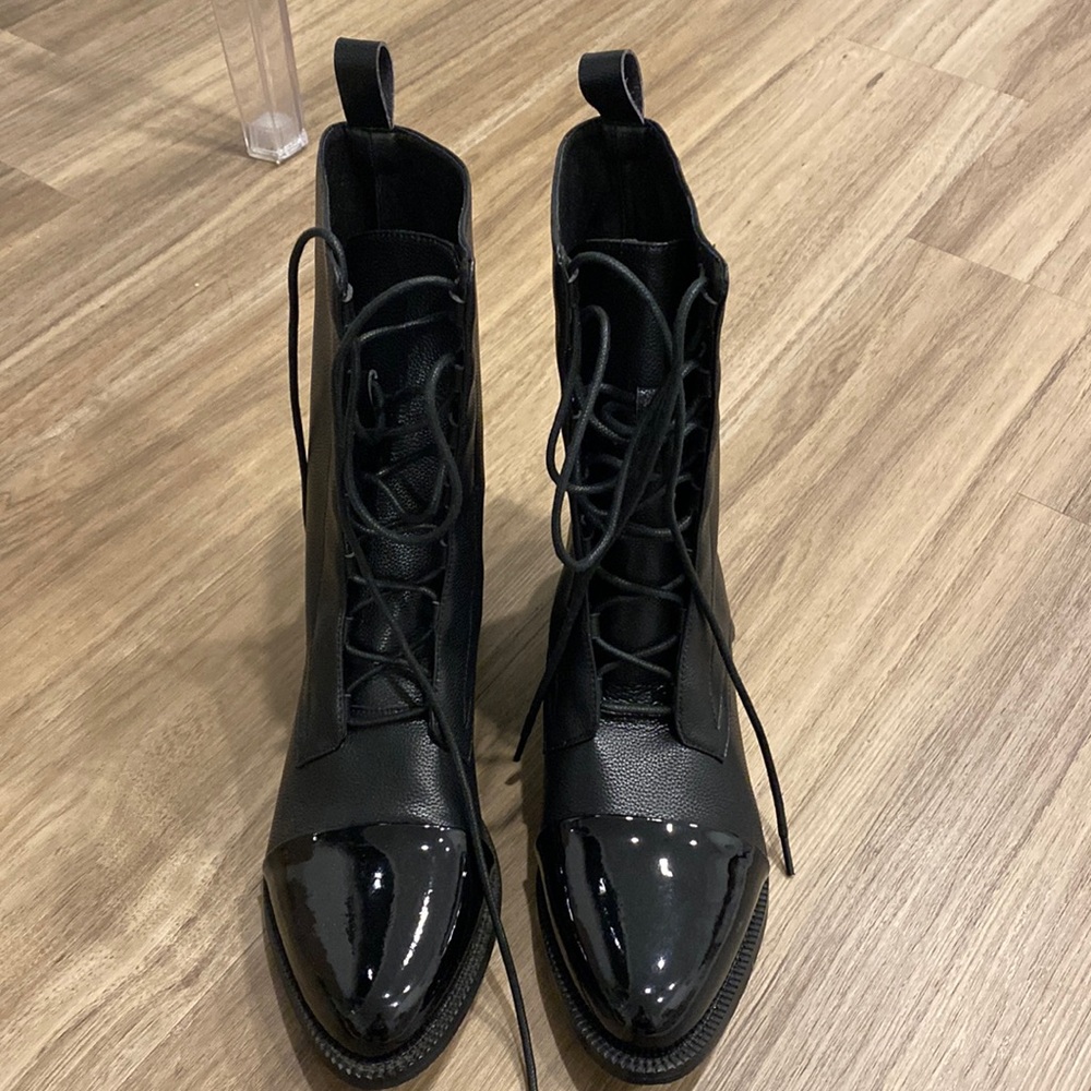 Black leather booties with patent leather toe
